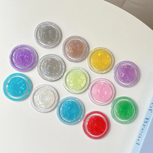 Collection of magnetic shell pattern phone grips in various shimmering pastel colors