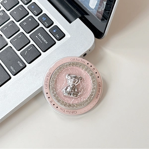 Detail of pink leather phone grip with silver bear, sparkling rhinestones and Gift For You text