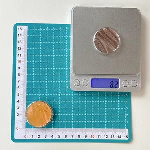 Macro view of round resin phone socket showing 8.2g weight on a scale and 4cm diameter size