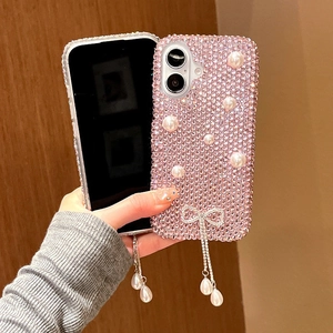 Coque luxe rose pour iPhone 16 Pro Max avec strass, nœud et pompons de perles