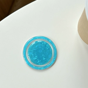 Detail shot of blue shell texture MagSafe phone grip with iridescent ice patterns