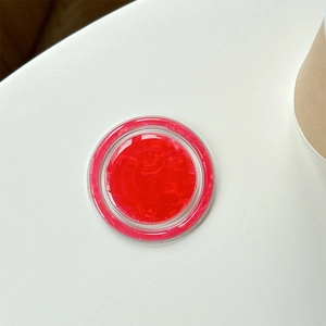 Detail of red magnetic phone grip featuring a sparkling shell texture and ice crack pattern