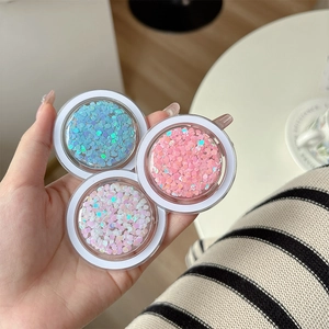 Three-pack of heart-shaped glitter sequins in mint, pink, and white for DIY and nail art
