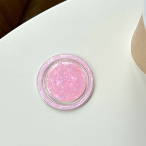 Close-up of pink shell texture Magsafe phone grip with glossy finish and clear edges