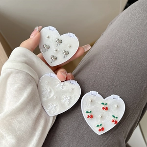 Cute heart-shaped compact mirrors with cherry, bow and pearl accents for women