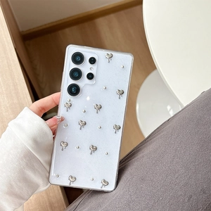 Detail of glitter heart phone case for Samsung S25 Ultra with silver lava hearts and pearls