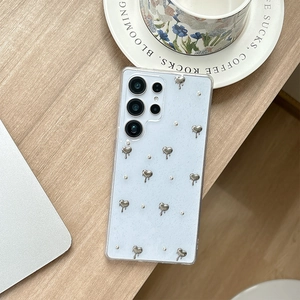 Close-up of light blue glitter phone case with 3D metal hearts for Samsung Galaxy Ultra