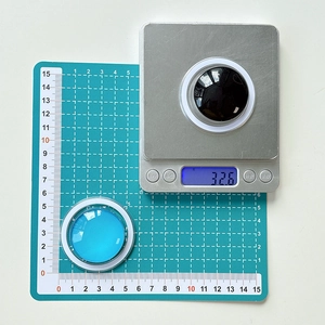 Detail view of the 5cm diameter crystal glass magnetic phone grip weighing 32.6g
