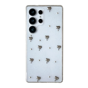White glitter Samsung S23 Ultra case with silver 3D melting heart charms and dots