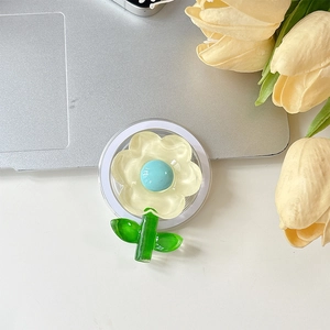 Détail d'un support de téléphone en forme de fleur avec une base transparente