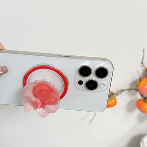 Pink cat paw magnetic phone socket with transparent design for MagSafe on white phone