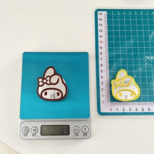 Close-up of cute rabbit-shaped mirror phone stand showing 4cm x 4.5cm dimensions