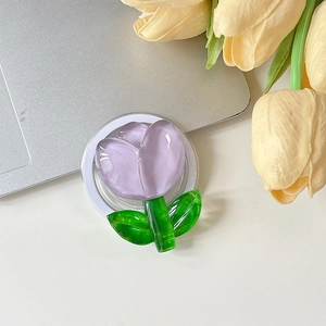 Détail du support de téléphone tulipe violette avec socle rétractable sur bureau