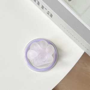 Detailed view of a purple cat paw magnetic phone socket with heart embossed detail