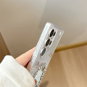 Detail showing transparent glitter phone case with silver rhinestone mirror for Samsung S24