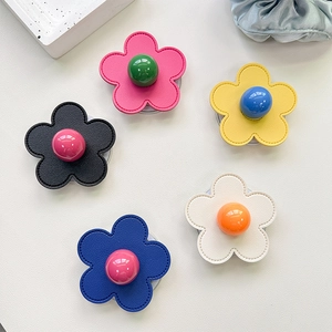 Leather flower phone grip set with colorful beads and decorative stitching details