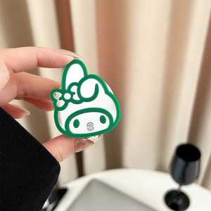 Detailed view of hand-held My Melody cartoon phone socket mirror with green border
