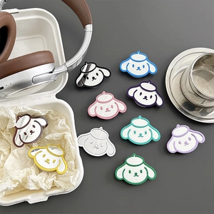 Support miroir pour téléphone chien de dessin animé en dix couleurs sur un bureau