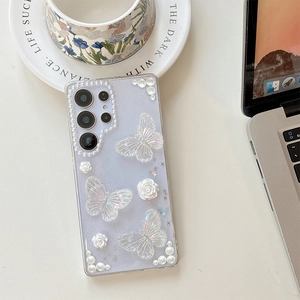 Detail of glitter phone case with 3D butterflies, roses and pearl accents for Samsung