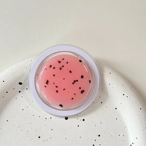 Close-up of glitter magnetic phone holder with elegant dried floral petals inside