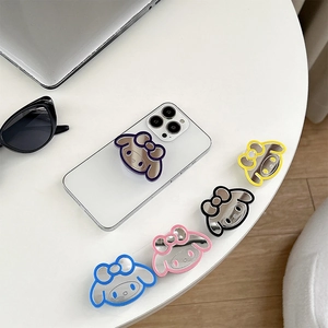 Close-up of a purple cartoon rabbit mirror phone grip on a white smartphone