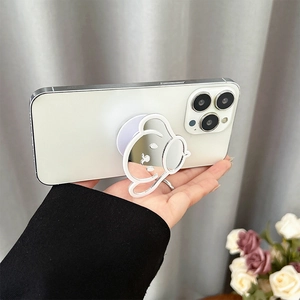 Support de téléphone chien cartoon avec miroir argenté sur smartphone blanc