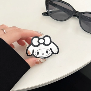 Close-up of My Melody cartoon character mirror phone grip holder with black outlines