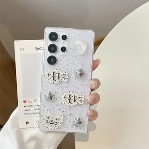 Detail of glitter Samsung Galaxy case with 3D cute cat, star and fish charms