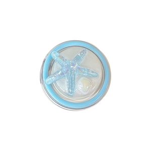 Sparkly light blue starfish phone grip with glitter and crystal on a white background