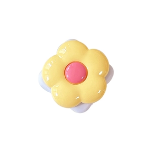 Minimalist yellow flower phone socket stand with pink center and glossy resin finish