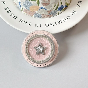Detail of pink leather phone socket with sparkling star rhinestone and Gift For You text