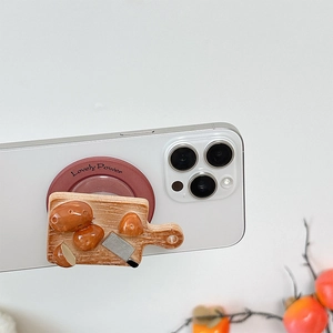 Macro shot of a creative 3d vegetable cutting board phone socket with a realistic potato design