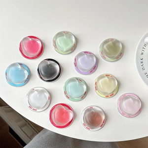 Transparent heart-shaped magnetic phone grip holder available in 12 macaron colors