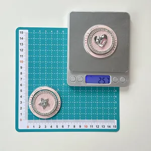 Pink heart and star phone grip with rhinestone border showing size and weight details