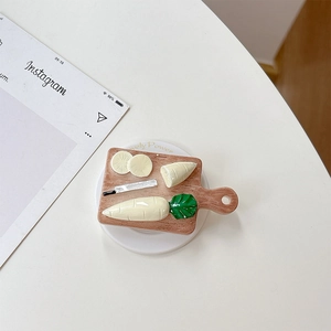 Macro detail of creative radish and knife on a mini wooden cutting board phone grip