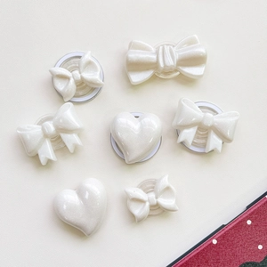 Pearlescent white glitter bow and heart shape collapsible phone grip stand set of seven pieces