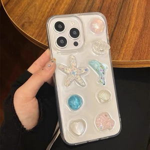 Coque iPhone transparente avec décorations 3D d'étoiles de mer et perles marines