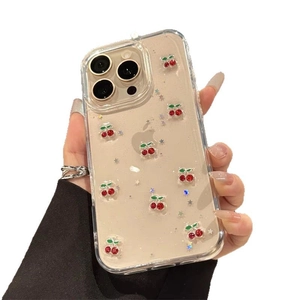 Clear iPhone case featuring glitter red cherries and sparkling star rhinestones