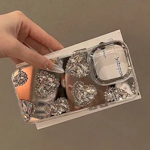 Luxury iPhone case with large 3D rhinestone hearts and premium mirrored finish for women