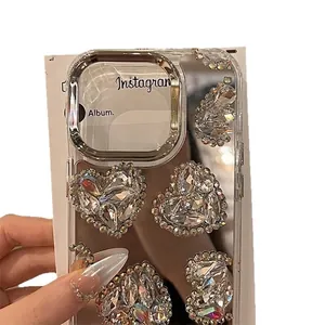 Luxury rhinestone heart mirror case for iPhone 17 Pro Max with glitter stone decor
