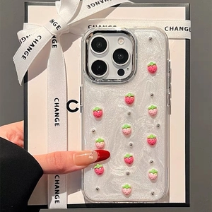 Glitter iPhone case featuring 3D pink strawberry charms and silver metallic beads decor