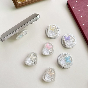 Multi-colored bow butterfly resin phone grip stands with seashell stones in vibrant hues