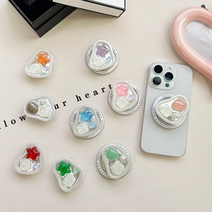 Set of nine pearl and shell heart phone socket grips with ocean star resin patterns