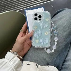 Detail of floral iPhone case with 3D bows and pearl flowers on mint wavy frame
