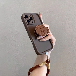 Brown leather Taiyaki stand phone case for iPhone with a braided crossbody strap lanyard