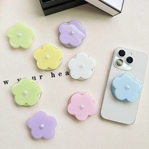 Floral magnetic phone grip with pearl accent in pastel colors and white smartphone