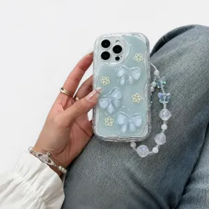 Blue glitter iPhone case with 3D bows, pearl flowers and a matching beaded charm strap
