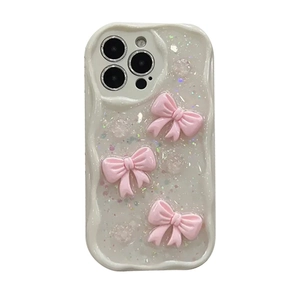 White wavy edge iPhone case with glitter flakes and pink 3D resin bowknots decor