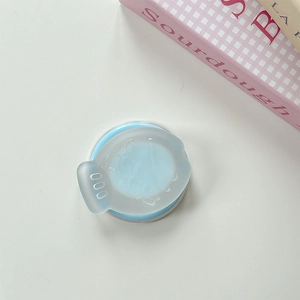 Close-up of a blue telescopic magnetic phone stand with a smiley face design and pull tab