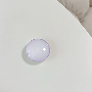 Macro detail of lavender translucent crystal glass round expandable phone grip